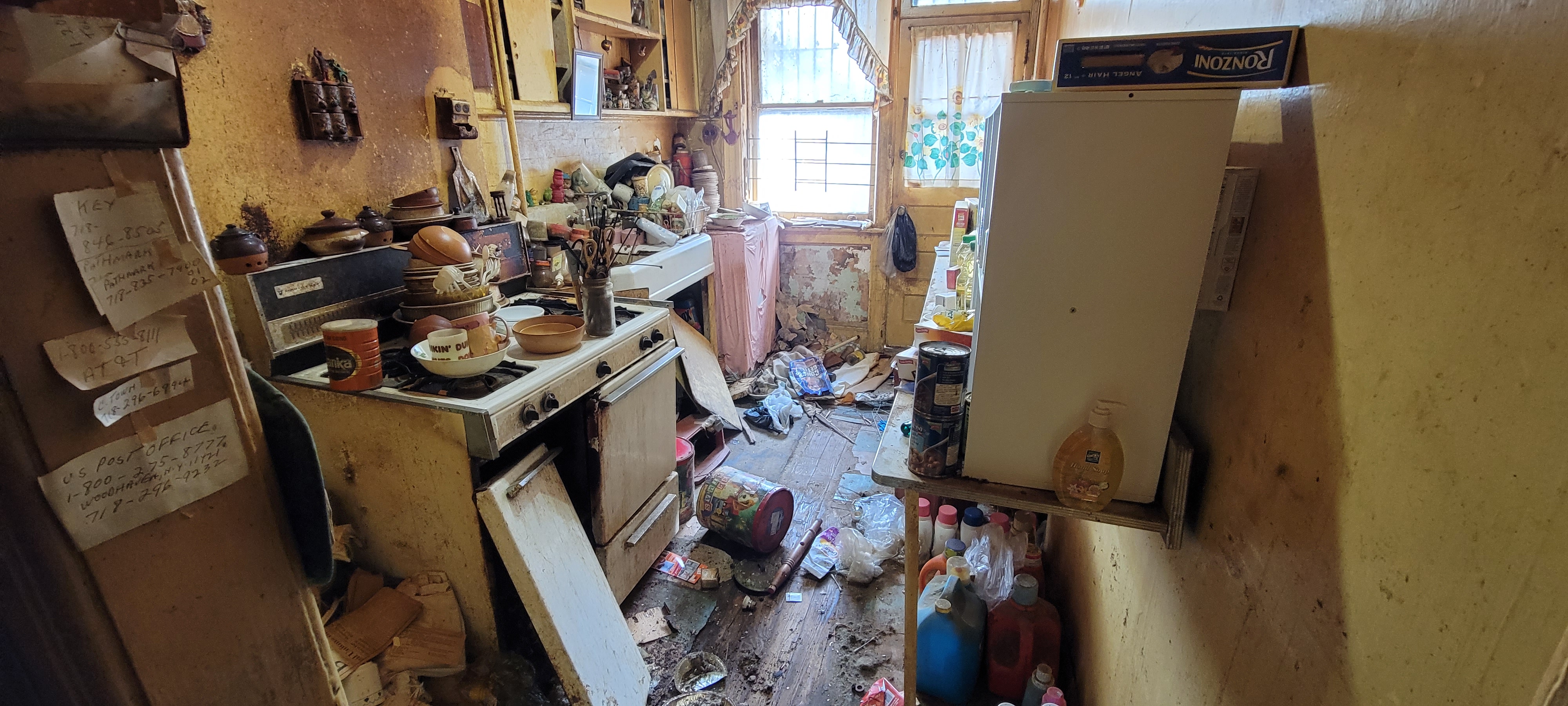 Hoarder kitchen before cleaning in Queens